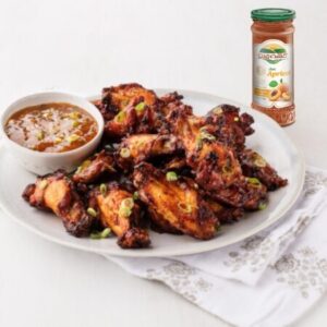 apricot chicken wings on a plate with Persian Pantry apricot jam